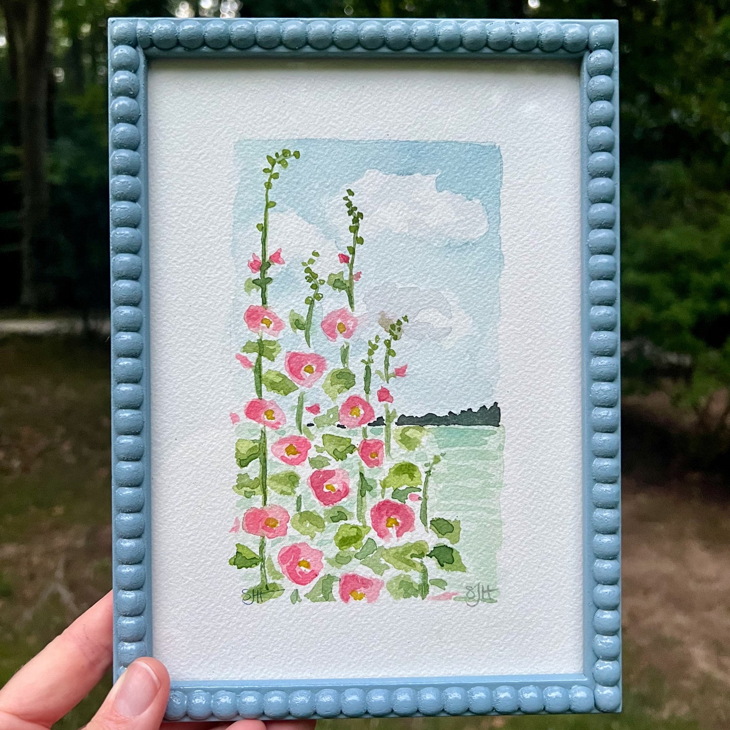 Hollyhocks with a View