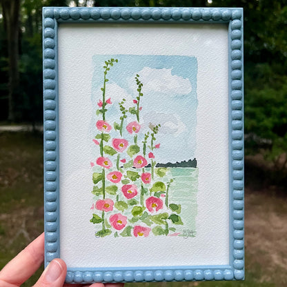 Hollyhocks with a View